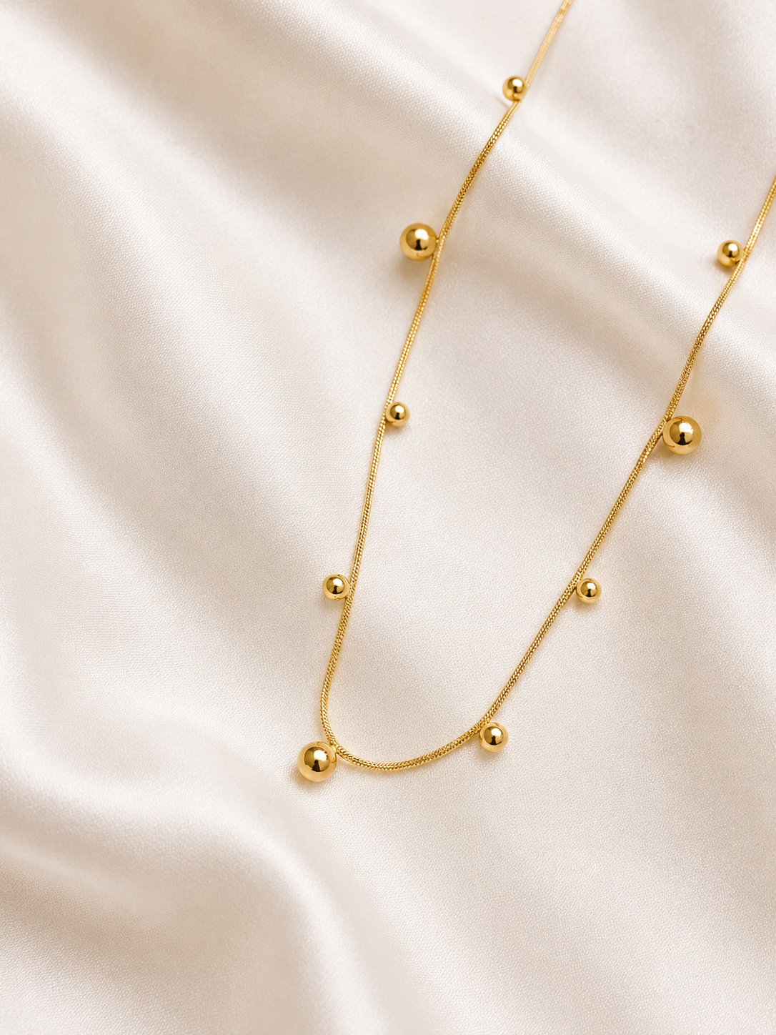 Gold Bead Station Snake Chain Necklace